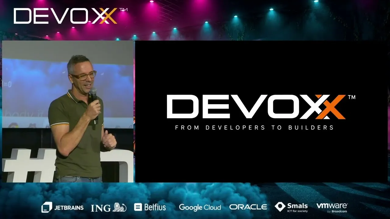 Stephan Janssen opening Devoxx Belgium 2026 next to the From developers to builders slide